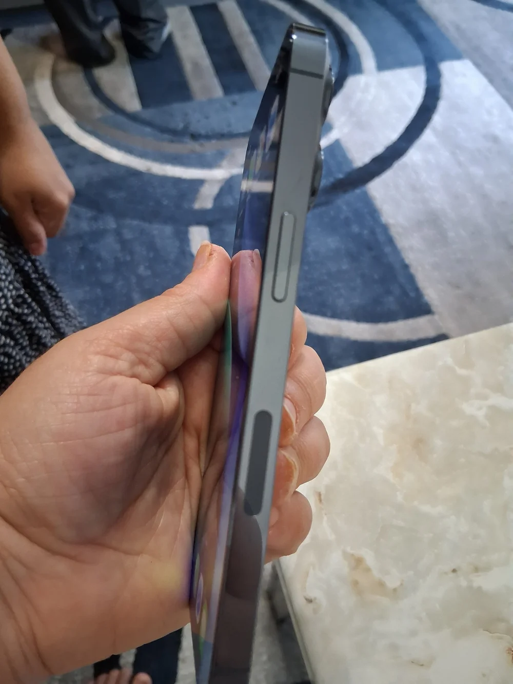 Apple Black Smartphone with Blue-Green Display